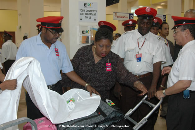 Minister of Tourism, Hon. Edmund Bartlett - Director of Tourism, Basil Smith, and Mayor of Montego Bay, Councillor Charles Sinclair Launch of Winter Tourism Season at Sangster International Airport, Saturday, December 15, 2007 - Sangster International Airport - MBJ Airports Limited, Montego Bay, Jamaica W.I. - Photographs by Net2Market.com - Barry J. Hough Sr, Photographer - Negril Travel Guide, Negril Jamaica WI - http://www.negriltravelguide.com - info@negriltravelguide.com...!