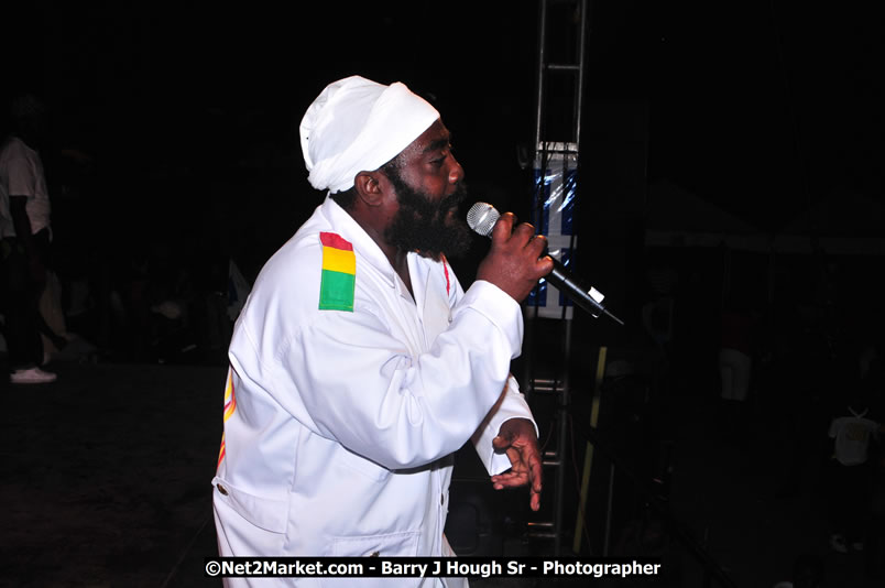 Lucea Cross the Harbour @ Lucea Car Park - All Day Event - Cross the Harbour Swim, Boat Rides, and Entertainment for the Family - Concert Featuring: Bushman, George Nooksl, Little Hero, Bushi One String, Dog Rice and many local Artists - Friday, August 1, 2008 - Lucea, Hanover Jamaica - Photographs by Net2Market.com - Barry J. Hough Sr. Photojournalist/Photograper - Photographs taken with a Nikon D300 - Negril Travel Guide, Negril Jamaica WI - http://www.negriltravelguide.com - info@negriltravelguide.com...!