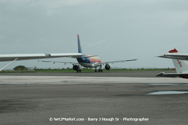 Air Jamaica Airline - Landing & Take Off - MBJ Airports Limited - Sangster International Airport - Domestic Terminal - Montego Bay, St James, Jamaica W.I. - MBJ Limited - Transforming Sangster International Airport into a world class facility - Photographs by Net2Market.com - Negril Travel Guide, Negril Jamaica WI - http://www.negriltravelguide.com - info@negriltravelguide.com...!