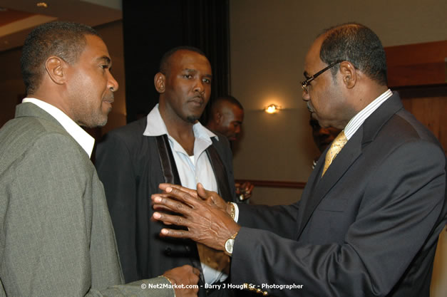 Red Cap Porters Awards - Minister of Tourism, Hon. Edmund Bartlett - Director of Tourism, Basil Smith - Friday, December 14, 2007 - Holiday Inn Sunspree, Montego Bay, Jamaica W.I. - Photographs by Net2Market.com - Barry J. Hough Sr, Photographer - Negril Travel Guide, Negril Jamaica WI - http://www.negriltravelguide.com - info@negriltravelguide.com...!